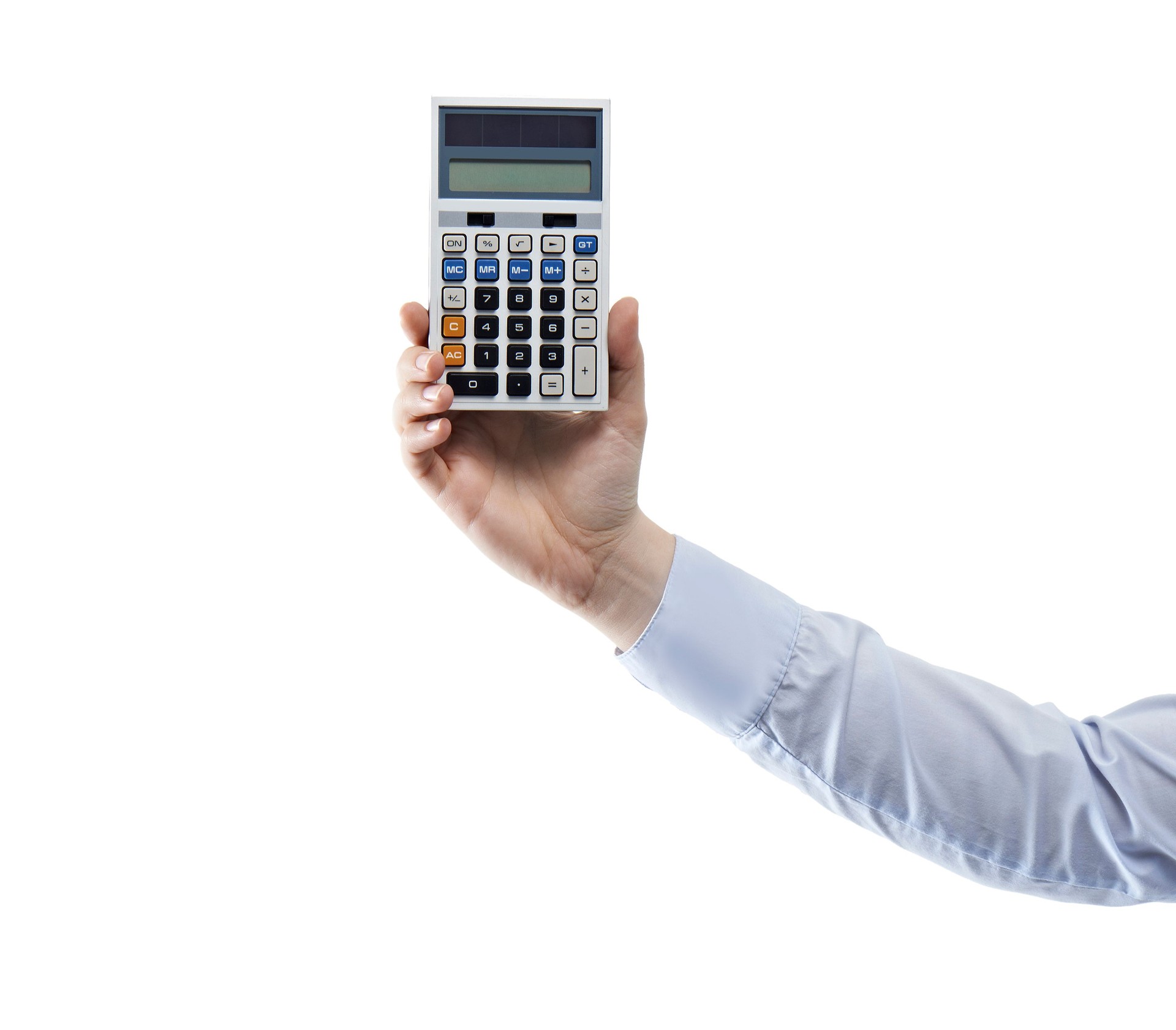 Businessman holding calculator